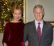 La princesse Mathilde était somptueuse en rouge au bras du prince Philippe. La famille royale de Belgique assistait le 19 décembre 2012 au palais Laeken, à Bruxelles, au concert de Noël annuel, suivi d'une réception.