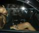 Rihanna, sublime, quitte le Playhouse, une boîte de nuit de Los Angeles, au bras de son amie Melissa, le 24 janvier 2013. Rihanna arbore une robe très courte noire transparente sans soutien-gorge sur de somptueux talons.