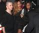 Rihanna, sublime, quitte le Playhouse, une boîte de nuit de Los Angeles, au bras de son amie Melissa, le 24 janvier 2013. Rihanna arbore une robe très courte noire transparente sans soutien-gorge sur de somptueux talons.