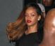 Rihanna, sublime, quitte le Playhouse, une boîte de nuit de Los Angeles, au bras de son amie Melissa, le 24 janvier 2013. Rihanna arbore une robe très courte noire transparente sans soutien-gorge sur de somptueux talons.