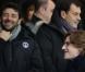 Patrick Bruel et Jean Sarkozy lors du match entre le Paris Saint-Germain et l'Olympique de Marseille (2-0) au Parc des Princes à Paris le 24 février 2013