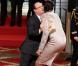 François Hollande et les filles de l'équipe de basket lors de la cérémonie de remise de la Légion d'honneur aux sportifs médaillés à Londres lors des Jeux olympiques, au palais de l'Elysée le 1er mars 2013 à Paris