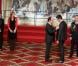 Valérie Trierweiler, Francois Hollande et Tony Estanguet lors de la cérémonie de remise de la Légion d'honneur aux sportifs médaillés à Londres lors des Jeux olympiques, au palais de l'Elysée le 1er mars 2013 à Paris