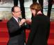 François Hollande et Camille Muffat lors de la cérémonie de remise de la Légion d'honneur aux sportifs médaillés à Londres lors des Jeux olympiques, au palais de l'Elysée le 1er mars 2013 à Paris