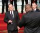François Hollande et Teddy Riner lors de la cérémonie de remise de la Légion d'honneur aux sportifs médaillés à Londres lors des Jeux olympiques, au palais de l'Elysée le 1er mars 2013 à Paris