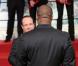 François Hollande et Teddy Riner lors de la cérémonie de remise de la Légion d'honneur aux sportifs médaillés à Londres lors des Jeux olympiques, au palais de l'Elysée le 1er mars 2013 à Paris
