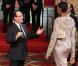François Hollande et Sandrine Gruda lors de la cérémonie de remise de la Légion d'honneur aux sportifs médaillés à Londres lors des Jeux olympiques, au palais de l'Elysée le 1er mars 2013 à Paris