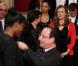 Valérie Trierweiler et François Hollande lors de la cérémonie de remise de la Légion d'honneur aux sportifs médaillés à Londres lors des Jeux olympiques, au palais de l'Elysée le 1er mars 2013 à Paris