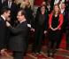 Valérie Trierweiler et François Hollande lors de la cérémonie de remise de la Légion d'honneur aux sportifs médaillés à Londres lors des Jeux olympiques, au palais de l'Elysée le 1er mars 2013 à Paris