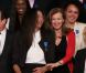 Valerie Trierweiler et Emmeline Ndongue lors de la cérémonie de remise de la Légion d'honneur aux sportifs médaillés à Londres lors des Jeux olympiques, au palais de l'Elysée le 1er mars 2013 à Paris