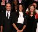 Valérie Trierweiler et François Hollande encadrent Emmeline Ndongue lors de la cérémonie de remise de la Légion d'honneur aux sportifs médaillés à Londres lors des Jeux olympiques, au palais de l'Elysée le 1er mars 2013 à Paris