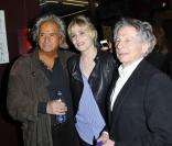 Albert Koski, Emmanuelle Seigner et Roman Polanski lors de l'avant-première du film Des gens qui s'embrassent le 1er avril 2013 à Paris