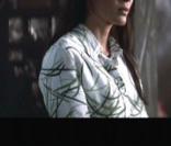 Michelle Yeoh interprète Wai Lin dans Demain ne meurt jamais (1997)
