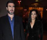 Rachida Brakni et Eric Cantona, parfaits au défilé Giorgio Armani hier soir