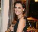 Inès de la Fressange, avec son sac Roger Vivier siglé de son prénom, et sa petite Violette, le 28/01/09