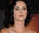 Deux sérieux atouts de Katy Perry mis en valeur sur cette photo : ses yeux bleu lagon (qui ressortent grâce au choix de couleur de sa robe), et un décolleté magnifique...