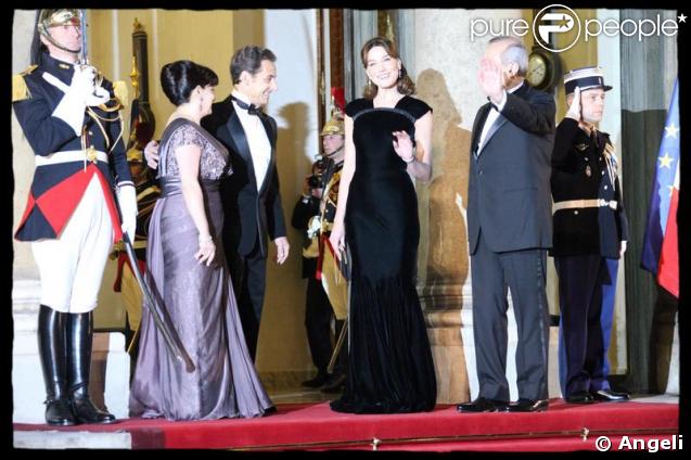 Carla Bruni entourée de Nicolas Sarkozy, Michel Sleimane et sa femme Wafaa, une élégance rare  