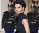 Rachida Dati à son arrivée à l'Elysée. Une robe délicatement fendue et une pochette qui rappelle les sandales, le top ! 