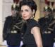 Rachida Dati à son arrivée à l'Elysée. Une robe délicatement fendue et une pochette qui rappelle les sandales, le top ! 