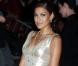 Eva Mendes portait une sublime robe Calvin Klein, marque dont elle est l'égérie.