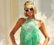 Paris Hilton pour une fois sobre dans une robe verte à volants.  