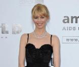 Claudia Schiffer à la grande soirée de l'amfAR. 21/05/09