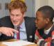 Prince Harry rend visite à des enfants défavorisés d'une école de Harlem, à NYC, hier