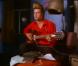 Brad Pitt en guitariste chevelu