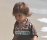 Matthew McConaughey et son petit Levi, sur la plage de Malibu, le 28 août 2009
