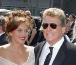 Ryan O'Neal et une belle inconnue lors des pré-Emmy Awards le 14 septembre
