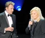 Johnny Hallyday et Sylvie Vartan sur la scène de L'Olympia le 18 septembre 2009, standing ovation dans la salle !