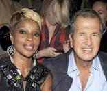 Mary J. Blige et Mario Testino au défilé Gucci lors de la Fashion Week italienne le 26 septembre 2009