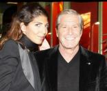 Jean-Claude Darmon et sa compagne Hoda Roche à l'inauguration de la statue de Rachida Dati, au musée Grévin. 13 octobre 2009