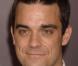 Robbie Williams au milieu des miss... Les têtes vont tourner !