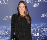  Olivia Wilde de la série  Dr House , présente hier soir à la soirée H&M pour le lancement de la collection de Jimmy Choo.   