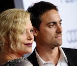 Charlize Theron et son compagnon Stuart Townsend lors de l'avant-première de  The Road , dans le cadre de l'AFI FEST, à Los Angeles, le 4 novembre 2009.