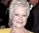 Judi Dench, à l'occasion de l'avant-première de Nine , qui s'est tenue à l'Odeon de Leicester Square le 3 décembre 2009.