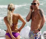 Le footballeur Andreï Voronin avec sa femme Yulia, en vacances à Miami Beach, le 30 décembre 2009