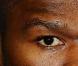 Pour 50 Cent, tout est dans le regard ! Et le regard qui tue du rappeur vaut beaucoup plus que... 50 cents !