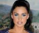 Katie Price est victime d'un TOC des plus distingués... Pour elle, le glamour passe par un seule et unique pose : les jambes écartés ! Vraiment pas très sexy !