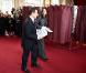 Carla et Nicolas Sarkozy sont allés voter pour le 1er tour des élections régionales. Paris, le 14 mars 2010