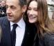 Carla et Nicolas Sarkozy amoureux à la sortie du bureau de vote, le 14 mars 2010