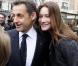 Carla et Nicolas Sarkozy amoureux à la sortie du bureau de vote, le 14 mars 2010