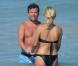 Le champion du monde Lothar Matthäus et sa superbe femme, Kristina Liliana, sur une plage de Miami, en Floride, le 20 mars 2010.