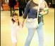 Suri Cruise, accompagnée de sa nounou, assiste à une projection.. en nuisette et pantoufles (10 avril 2010, NYC)
