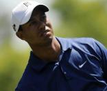 Tiger Woods : si son retour sur les parcours de golf est délicat, comme ici (photo) à Charlotte fin avril, la convalescence de sa famille après la révélation de ses liaisons extra-conjugales l'est encore plus...