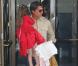 Tom Cruise et Katie Holmes sortent d'un spectacle, à Broadway. Suri Cruise est à leurs côtés, et porte ses chaussures à talons ! Mai 2010
