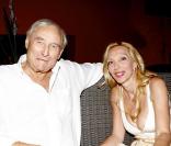 Gérard de Villiers et sa compagne Sylvie Elias lors de la soirée Monica Baccardi à l'Hôtel Byblos à Saint-Tropez le 27 juillet 2010