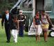 Barack Obama, sa femme Michelle, et leurs filles Malia et Sasha arrivent à la Maison Blanche