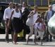 Barack Obama, sa femme Michelle, et leurs filles Malia et Sasha sont à Martha's Vineyard, dans le Massachusetts et se rendent à La Nouvelle-Orléans